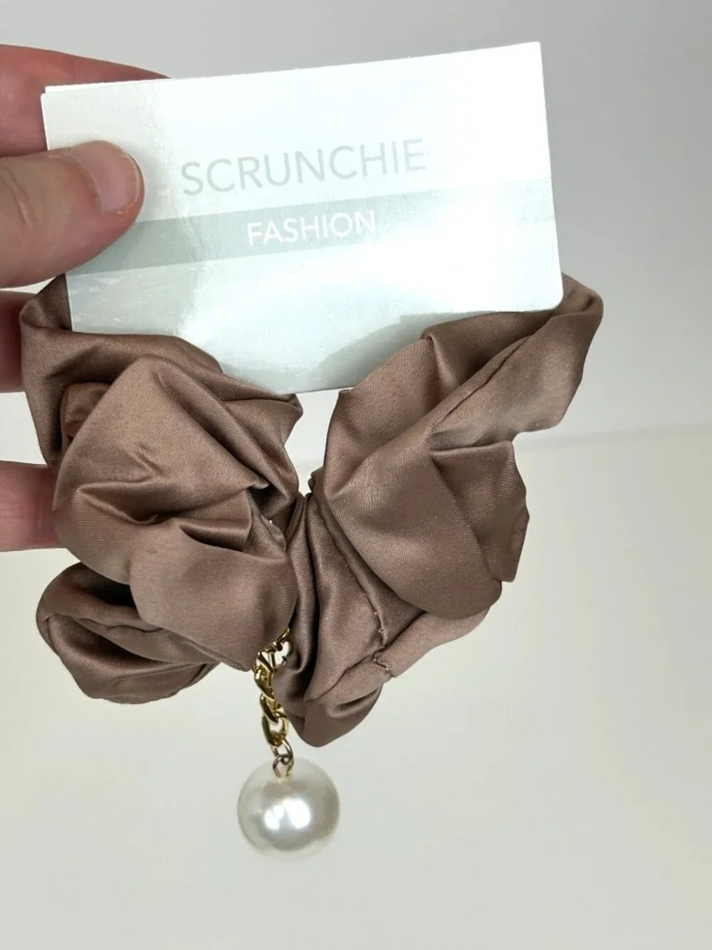 Taupe / brown satin hair scrunchie with a gold chain and hanging pearl charm New